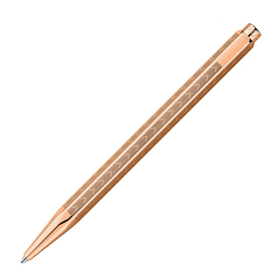 Caran d'Ache 849 Ecridor Gold Ballpoint Pen - Chevron Rose | Atlas Stationers.