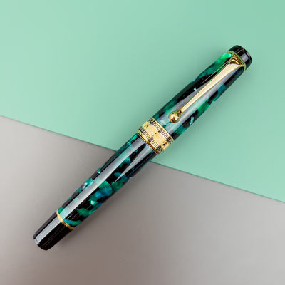 Aurora Optima Auroloide Fountain Pen - Emerald with Gold Trim | Atlas Stationers.